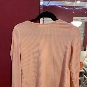Pink slit back top